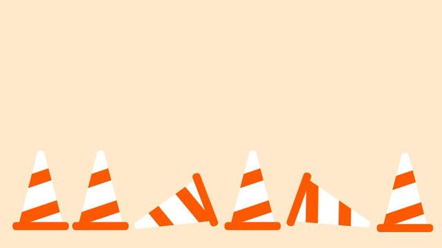 A row of orange traffic cones placed on the ground, symbolizing restricted areas, construction work, and safety precautions