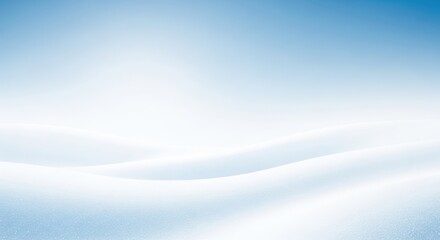 Naklejka premium Snowy hills under a soft blue sky, winter landscape scenery