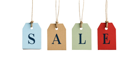 Colorful sale tags hanging on strings in blue, tan, green, and red