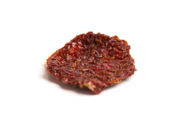 dried tomato piece on white background