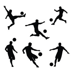 Dynamic silhouettes of soccer players in action kicking and jumping capturing the sport's energy silhouette