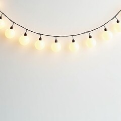 Hanging garland of decorative string lights with warm glowing round bulbs. Festive party or holiday background concept.