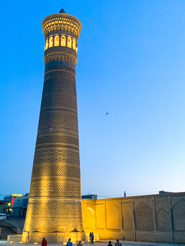 Po-i Kalan complex at sunset and night time, Bukhara, Uzbekistan - light illumination  
