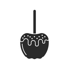 Black silhouette of candy apple with stick and dripping caramel