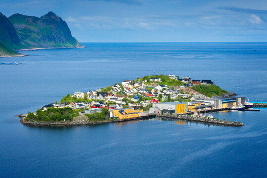 Hus&oslash;y island in the &Oslash;yfjorden off the northwest coast of the large island of Senja, Norway