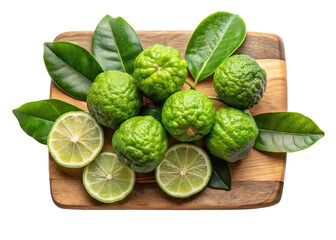 Fresh kaffir lime fruits and leaves arranged on a wooden board isolated on transparent background