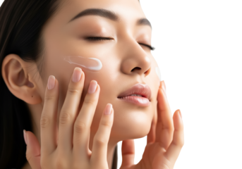 Young woman with closed eyes gently touching face, expressing beauty, serenity, skincare, wellness, softness, and confidence. applying moisturizing cream on the face