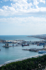 Fototapeta premium Aerial view of a busy port and coastline