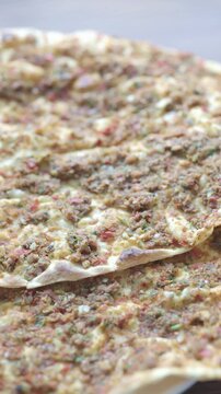 Traditional Turkish dish lahmacun in close-up