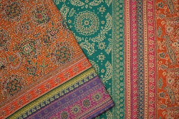 Abstract shirting design featuring traditional Ajrakh, Ikat, block, and batik print patterns in a digital textile background