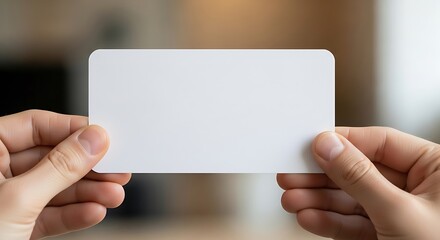 Hands presenting a blank card for personalized message or design concept