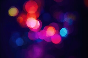 Out-of-focus vibrant neon glow with layered lights and bright spots. Multicolored bokeh style. Advanced LED illumination. Soft shades against a dark abstract background.