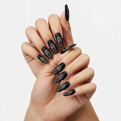 Halloween nail art with white manicure decorated with spider web design