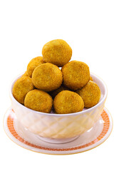 typical Brazilian fritter, savory fried in oil, with cheese, cassava, corn, cornmeal or aipin flavors, crispy and round dumpling served hot, white isolated background