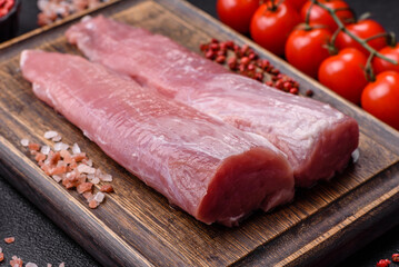 Raw pork tenderloin, fresh meat, a source of protein, and an ingredient for a meal. Pork tenderloin