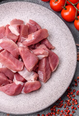 Raw pork, sliced, fresh meat, a source of protein, and an ingredient for a hearty meal. Raw pork