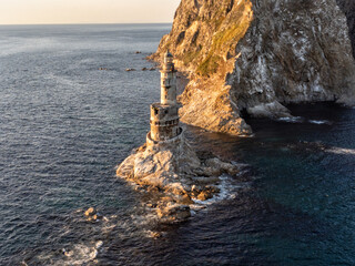 Aerial View The abandoned lighthouse Aniva in Sakhalin Island,Russia, at sunset