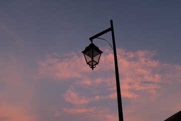 Lamp Post Against Colorful Clouds
