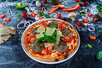 Special Meat Pizza with Parmesan, Arugula, and Sliced Tomatoes