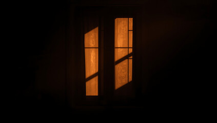 Warm Sunlight Streaming Through a Dark Window with Geometric Shadows abstract architecture