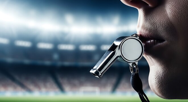 Close-up of Referee Blowing Whistle on Blurred Soccer Field with Stadium Lights - Powered by Adobe