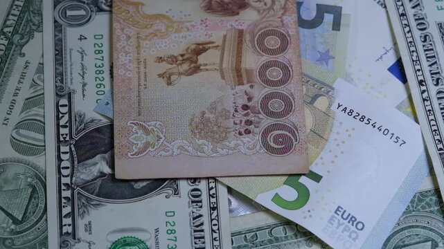 W&auml;hrungen Euro Dollar Yen, rotierende EUR USD und JPY Bargeld Banknoten Geldscheine, Bargeld