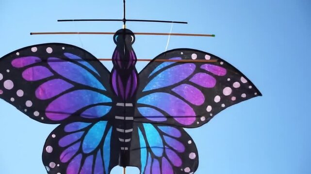 Butterfly kite against a clear sky