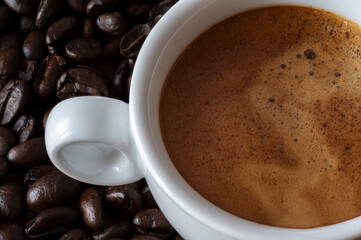 Italian Espresso coffee on coffee beans