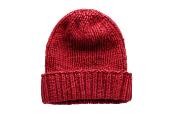 A cozy red knit beanie resting on a white surface, perfect for chilly days and seasonal fashion isolated on transparent background