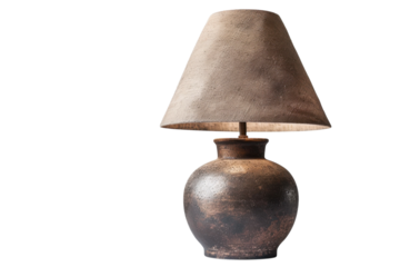 Artisan table lamp with a textured shade and clay base enhancing natural decor in a serene indoor setting isolated on transparent background