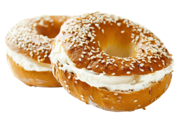 Deliciously creamy sesame bagels with a smooth filling ready to delight taste buds during a cozy breakfast isolated on transparent background