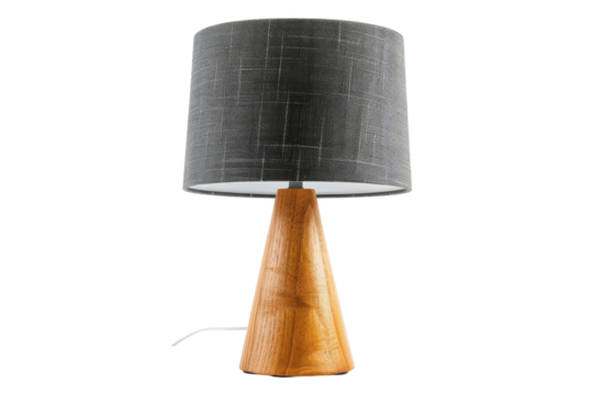 A modern table lamp with a wooden base and textured fabric shade illuminating a minimalist workspace isolated on transparent background