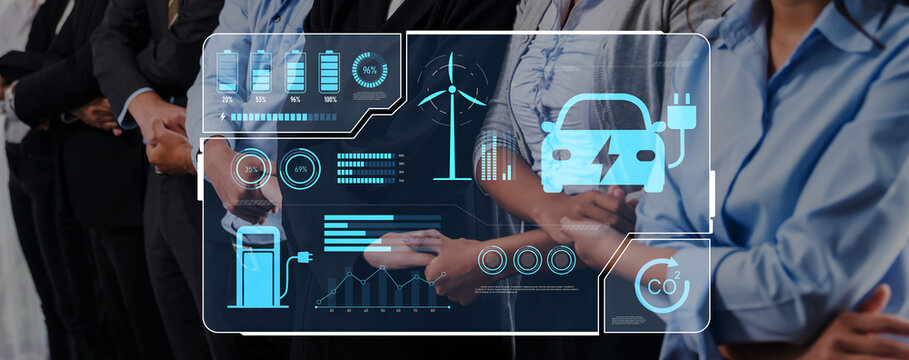 A professional group stands together with a digital overlay showcasing electric vehicle graphics and clean energy data, embodying innovation and teamwork for a sustainable future. Trope