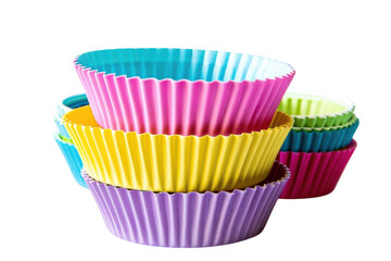 Colorful silicone baking cups stacked playfully against a bright background, perfect for creative baking adventures at home isolated on transparent background