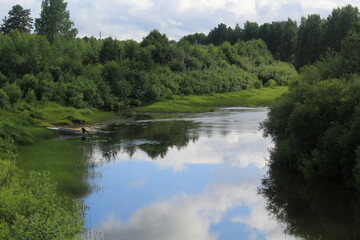 Fototapeta premium The Fedorovka River in the north of the Kirov region in summer