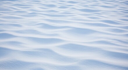 Abstract cool wavy water surface with soft light reflections creating a serene and calming abstract background.