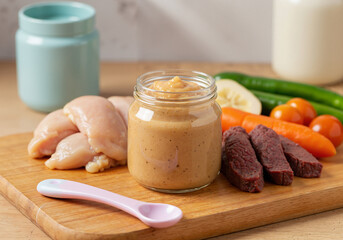 Baby puree meat mix with vegetables in glass jar