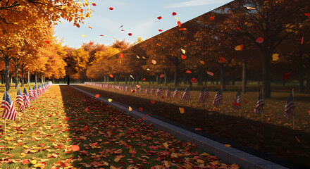 A serene autumn scene at a memorial site. Small American flags line the path, honoring veterans on Veterans Day.