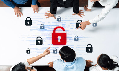 A diverse group of business professionals engaged in a collaborative meeting, focusing on...