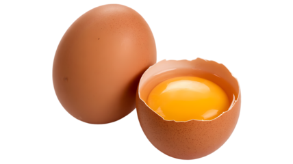 Two fresh chicken eggs, one whole and one cracked open isolated on white background