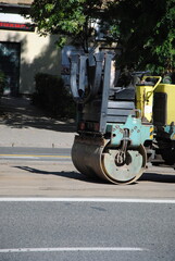 asphalt paving mashines at road construction site