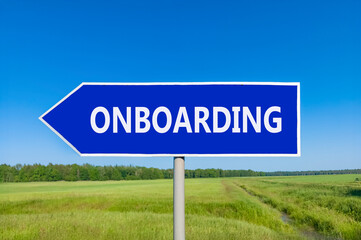 Onboarding success symbol. Concept word Onboarding on beautiful blue road sign. Beautiful blue sky green grass and forest peaceful nature background. Business onboarding success concept. Copy space.