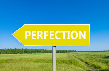 Perfection symbol. Concept word Perfection on beautiful yellow road sign. Beautiful blue sky green grass and forest peaceful nature background. Business perfection concept. Copy space.