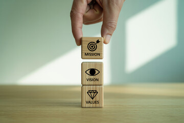 Corporate Business Vision Values Mission concept. Wooden blocks stack management planning