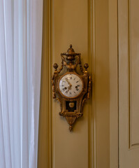 The old and vintage clock  in a room