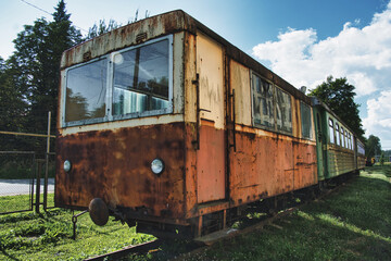 Abandoned Rusty Train Car on Old Railway