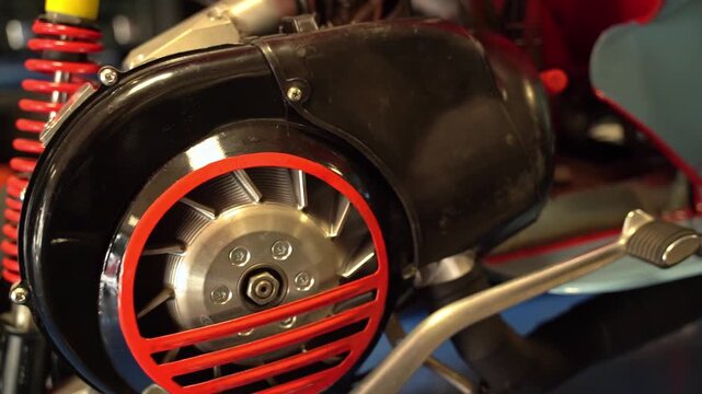 Close-up detail of a custom scooter engine flywheel