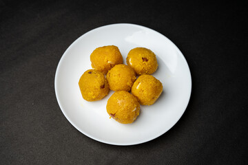 Plate of laddu, laddoo or ladoo a popular traditional Indian sweet treats made during festivals and religious ceremonies