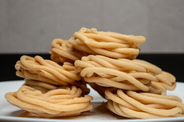Murukku is a savoury snack popular in south India and Sri Lanka. chakli south indian traditional vegetarian snack