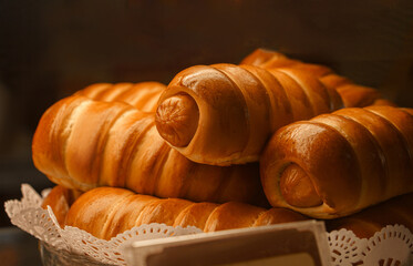 A close-up of a sausage roll. A traditional Russian pastry.